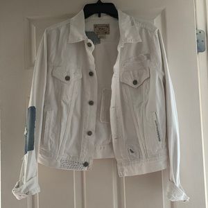White denim jacket by polo Ralph Lauren. Lots of denim distressed details. Med